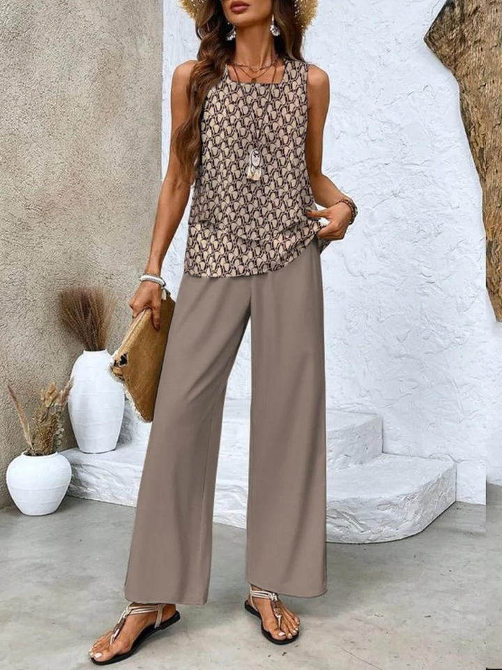 Women's summer set featuring a stylish layered top and wide-leg pants, perfect for casual outings. Lightweight and breathable fabric ideal for warm weather. 7
