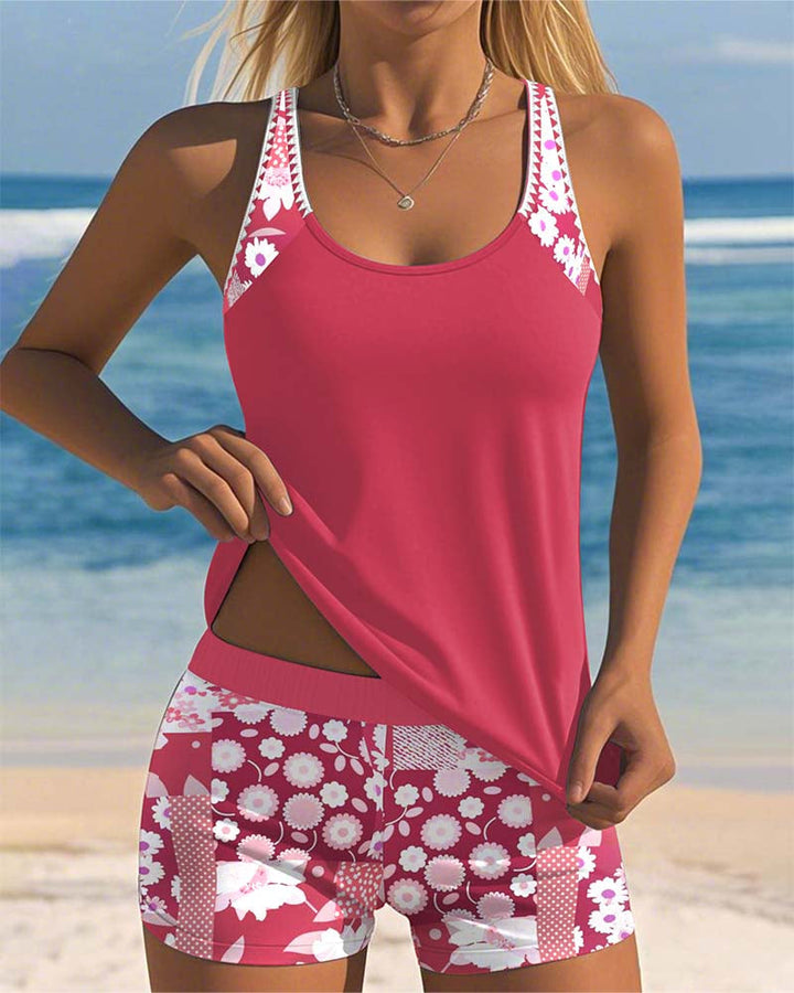 Women's tankini swimwear set featuring a stylish floral print and comfortable shorts, perfect for beach outings and poolside relaxation. 0