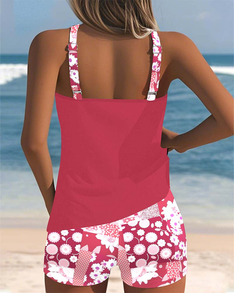 Women's tankini swimwear set featuring a stylish floral print and comfortable shorts, perfect for beach outings and poolside relaxation. 2