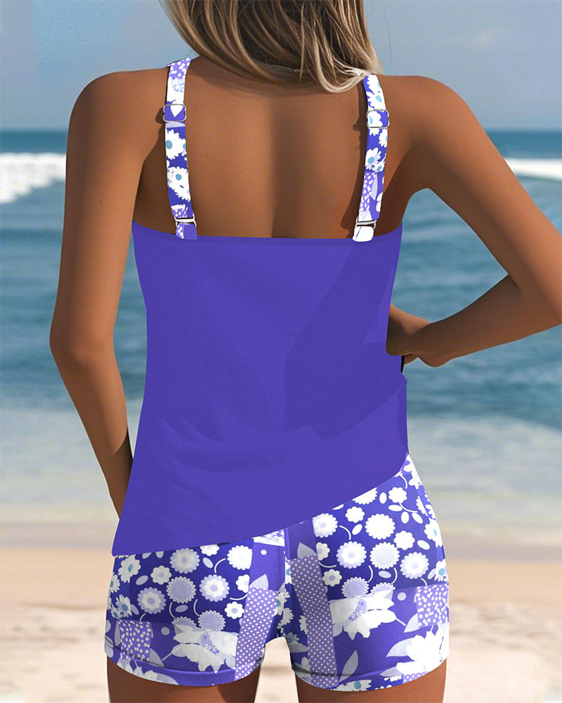 Women's tankini swimwear set featuring a stylish floral print and comfortable shorts, perfect for beach outings and poolside relaxation. 3