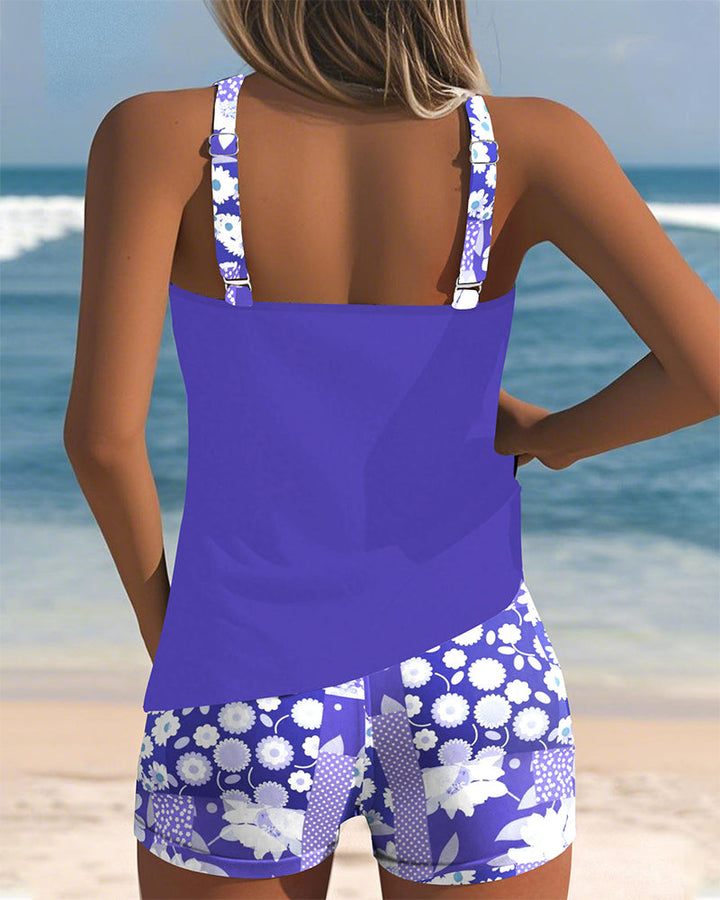 Women's tankini swimwear set featuring a stylish floral print and comfortable shorts, perfect for beach outings and poolside relaxation. 3