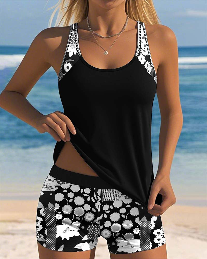 Women's tankini swimwear set featuring a stylish floral print and comfortable shorts, perfect for beach outings and poolside relaxation. 8