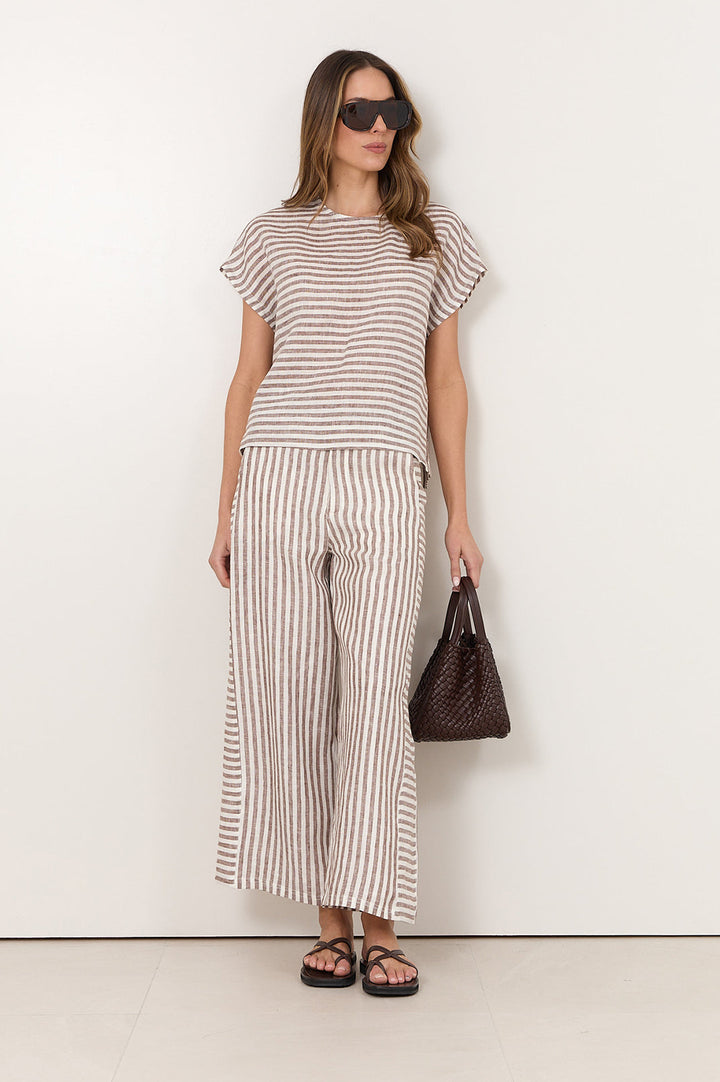 Women's relaxed fit top featuring a stylish chocolate and white stripe design, made from 100% breathable linen. 1
