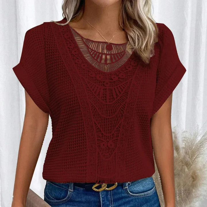 Women's relaxed fit cotton blend top featuring a round neck and delicate lace trim, perfect for everyday wear. 6