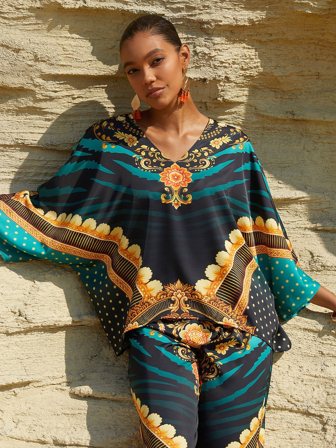 Women's Mediterranean Blue V-Neck Top with Batwing Sleeves in Silky Satin featuring a stylish jewelry print. 10