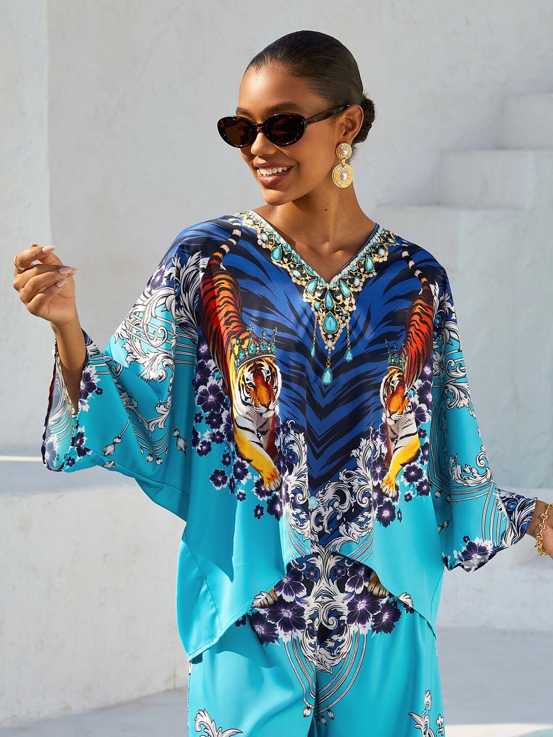 Women's Mediterranean Blue V-Neck Top with Batwing Sleeves in Silky Satin featuring a stylish jewelry print. 11