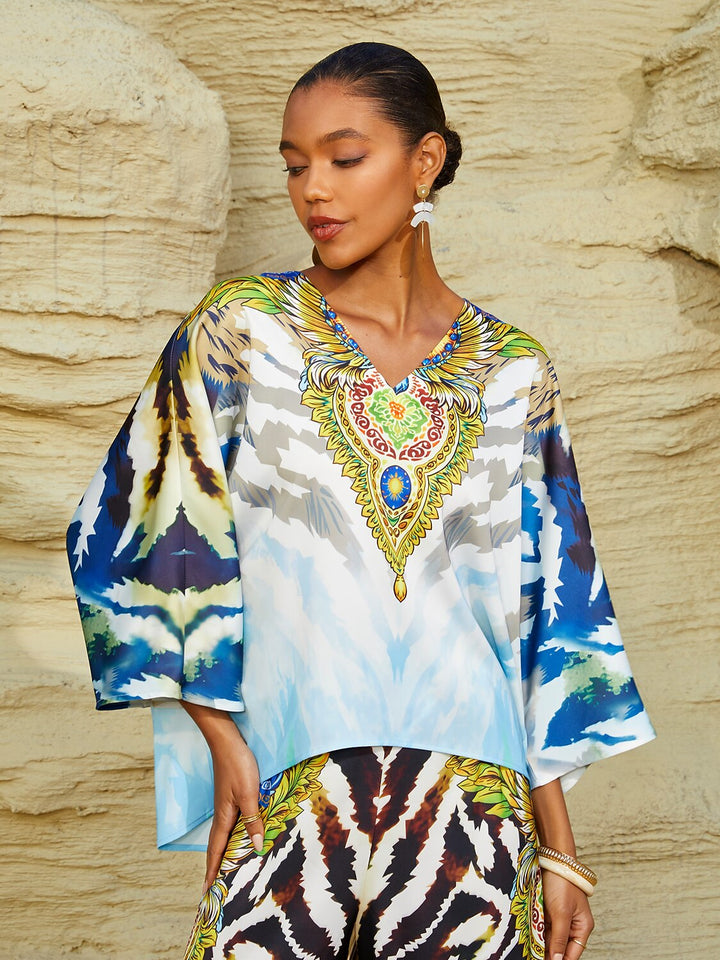 Women's Mediterranean Blue V-Neck Top with Batwing Sleeves in Silky Satin featuring a stylish jewelry print. 15