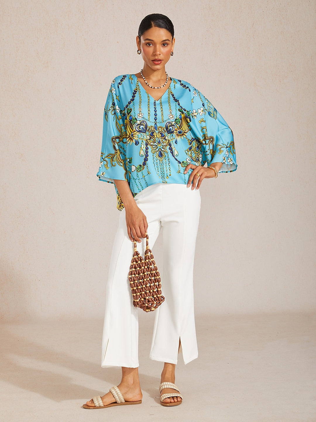 Women's Mediterranean Blue V-Neck Top with Batwing Sleeves in Silky Satin featuring a stylish jewelry print. 3