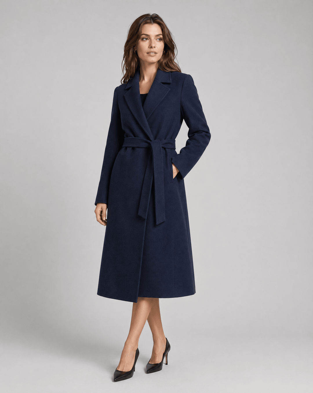 Elegant women's trench coat featuring a self-tie belt and notched lapels, designed with a stylish long wrap silhouette perfect for any occasion. 2