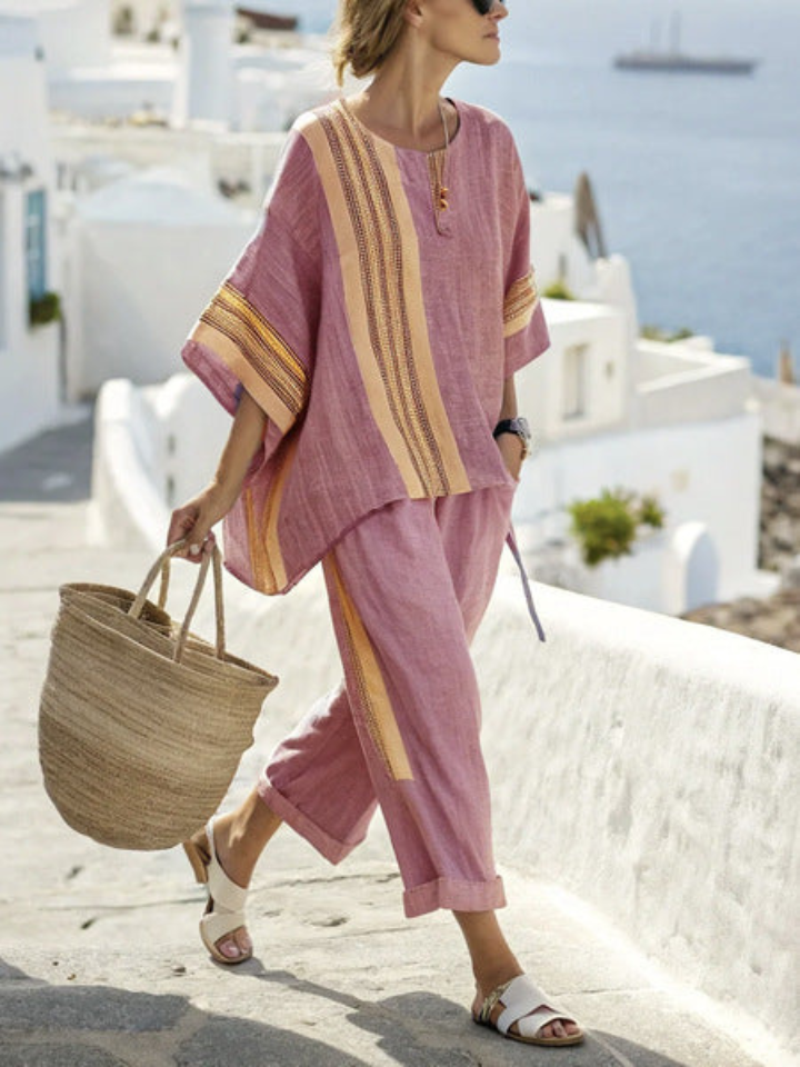 Women's lavender linen blend two-piece set featuring an oversized top with woven stripe detailing, perfect for casual summer outings. 1