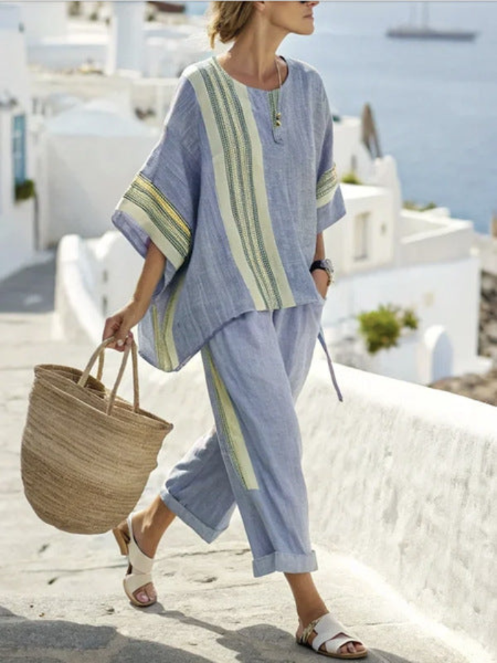 Women's lavender linen blend two-piece set featuring an oversized top with woven stripe detailing, perfect for casual summer outings. 2