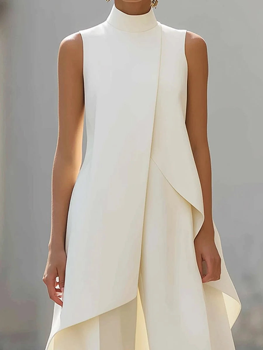Women's two piece set featuring an asymmetrical high neck top and wide-leg trousers, designed for an elegant and modern look, perfect for any occasion. 1