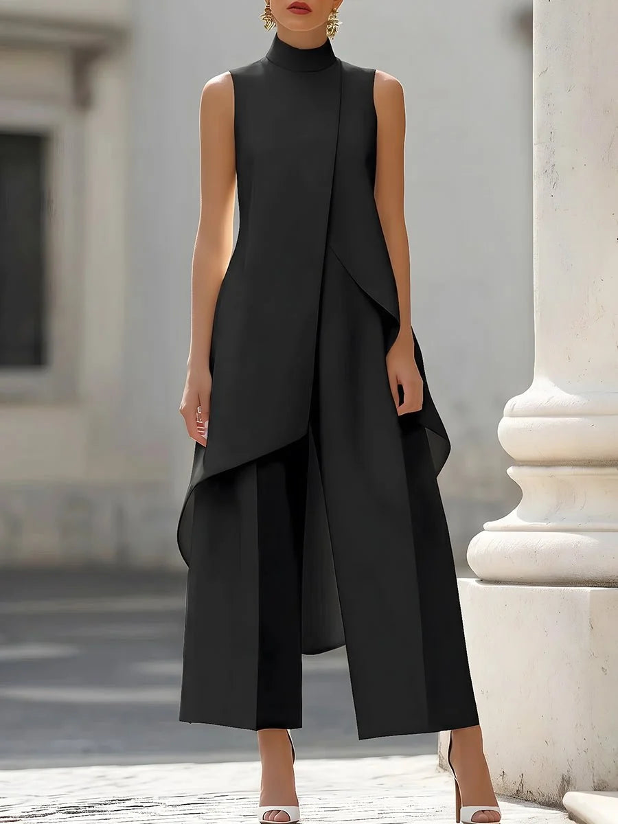 Women's two piece set featuring an asymmetrical high neck top and wide-leg trousers, designed for an elegant and modern look, perfect for any occasion. 4
