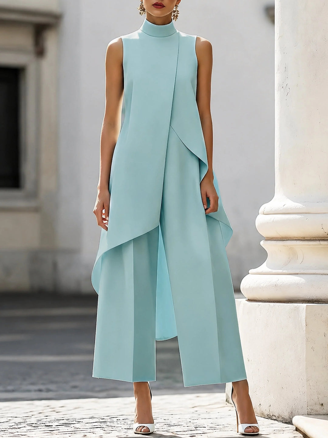 Women's two piece set featuring an asymmetrical high neck top and wide-leg trousers, designed for an elegant and modern look, perfect for any occasion. 6
