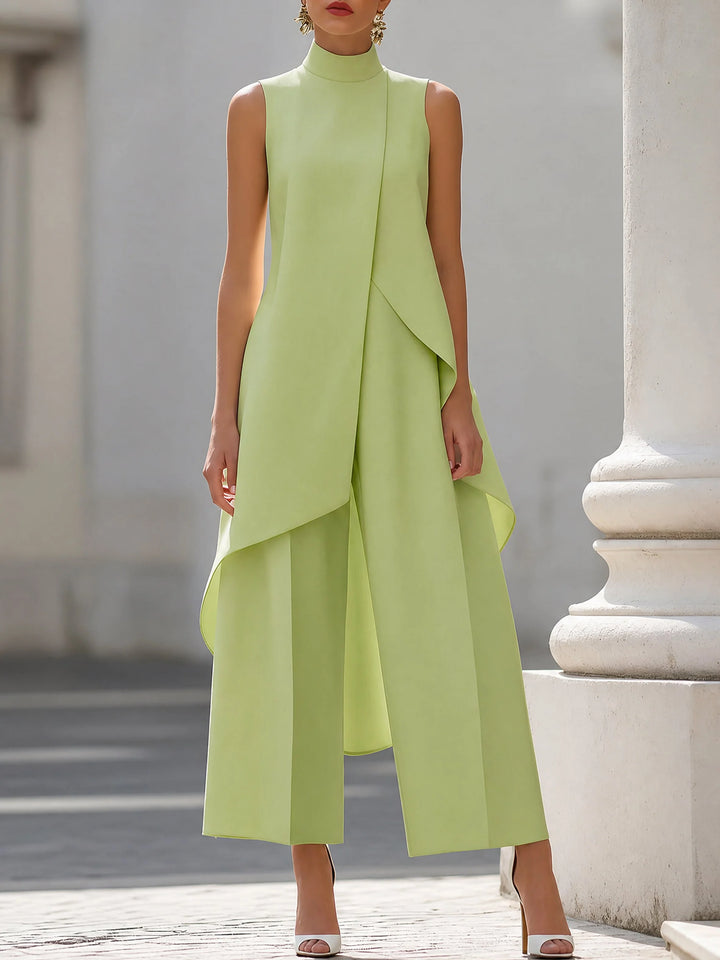 Women's two piece set featuring an asymmetrical high neck top and wide-leg trousers, designed for an elegant and modern look, perfect for any occasion. 7