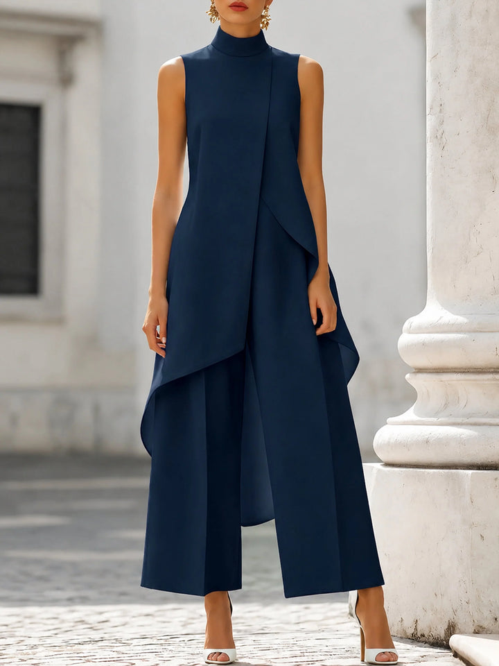 Women's two piece set featuring an asymmetrical high neck top and wide-leg trousers, designed for an elegant and modern look, perfect for any occasion. 8