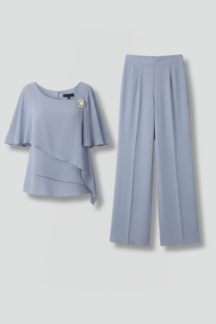 Women's two piece set featuring a stylish layered top and straight leg trousers in a semi-formal blue and navy design, perfect for various occasions. 1