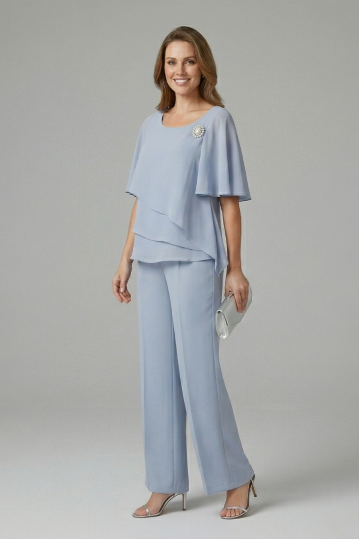 Women's two piece set featuring a stylish layered top and straight leg trousers in a semi-formal blue and navy design, perfect for various occasions. 2