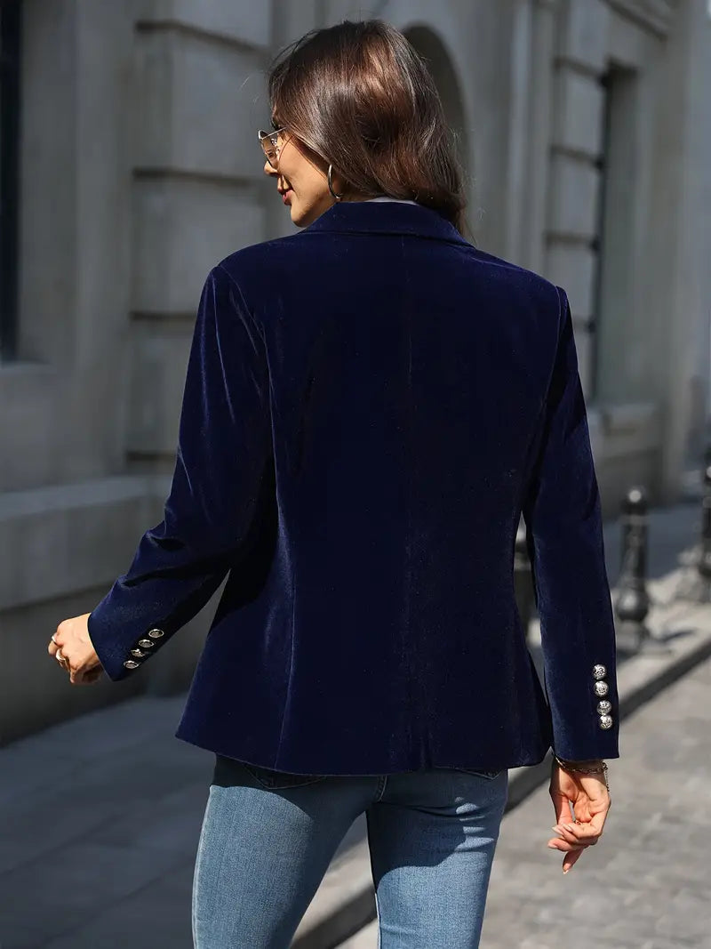 Women's black velvet blazer featuring a tailored design, ideal for versatile styling and elegant occasions. 6