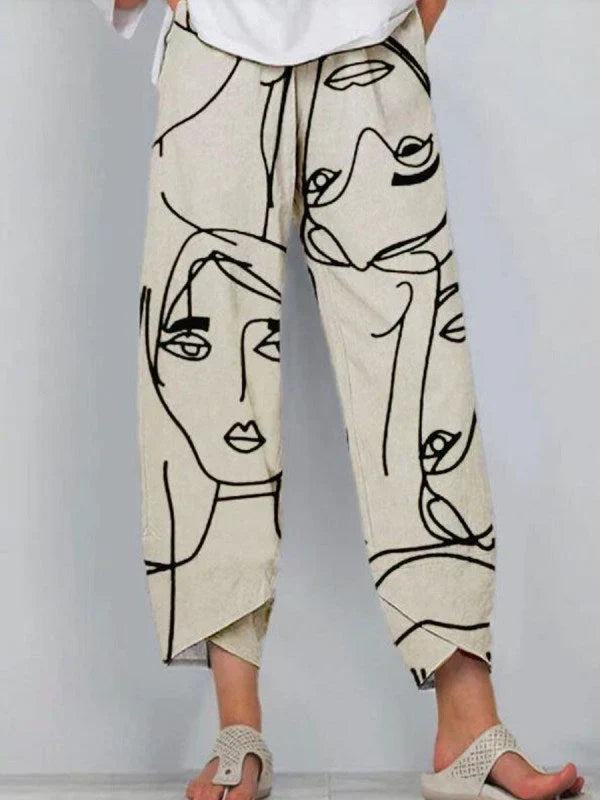 Women's wide leg trousers featuring an adjustable waist, crafted from a linen-cotton blend with a stylish abstract face print, perfect for comfortable and chic summer 0