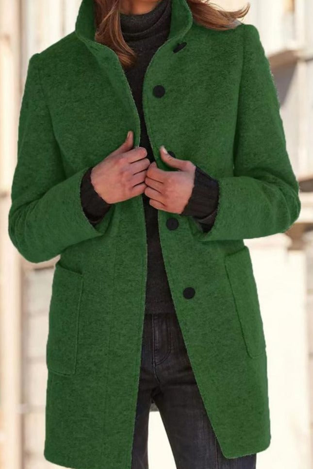 Women's wool coat featuring a tailored fit and stylish button closure, perfect for elegant winter outerwear. 2