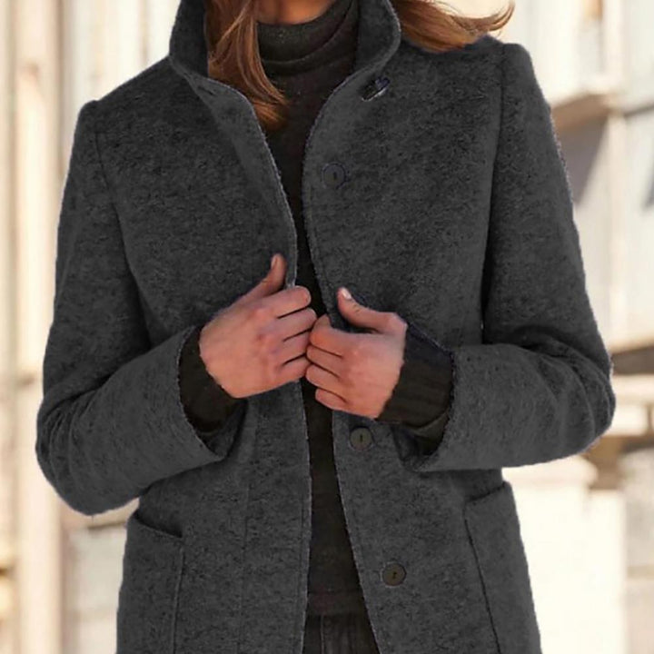 Women's wool coat featuring a tailored fit and stylish button closure, perfect for elegant winter outerwear. 4