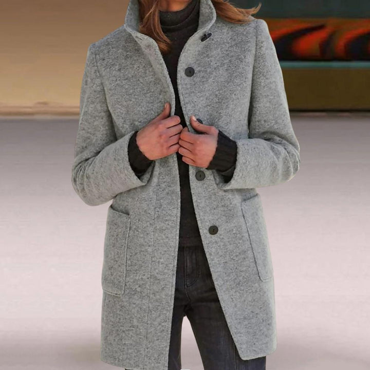 Women's wool coat featuring a tailored fit and stylish button closure, perfect for elegant winter outerwear. 5