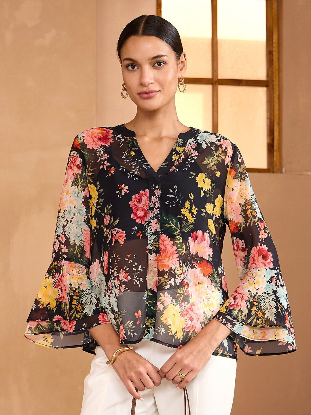Womens blouse featuring a V-neck and ruffle sleeves, made from flowy chiffon with a Moonlight Blossom floral design, perfect for summer wear. 2