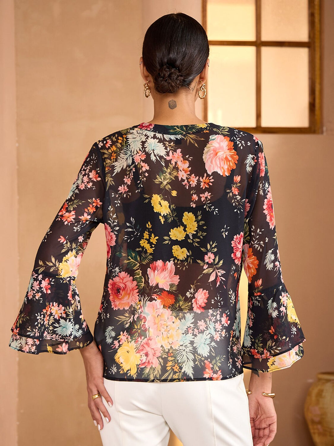 Womens blouse featuring a V-neck and ruffle sleeves, made from flowy chiffon with a Moonlight Blossom floral design, perfect for summer wear. 3