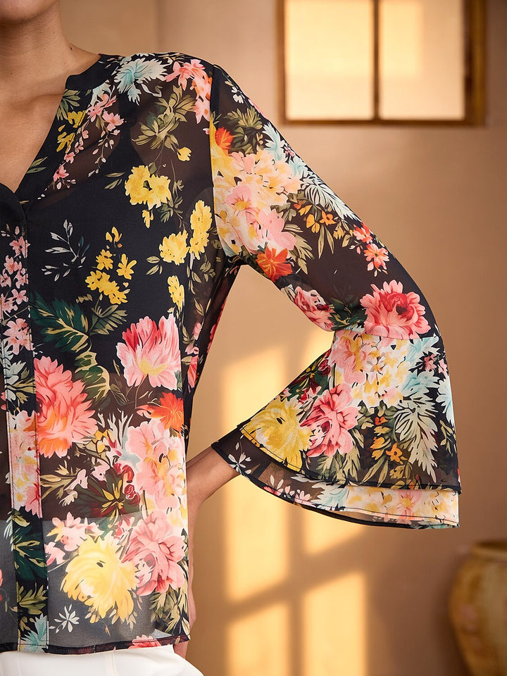 Womens blouse featuring a V-neck and ruffle sleeves, made from flowy chiffon with a Moonlight Blossom floral design, perfect for summer wear. 6
