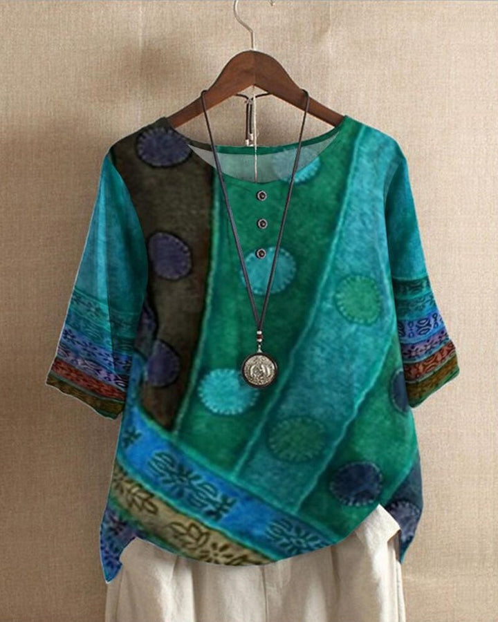 Womens blouse featuring a vintage print and loose fit, designed as a boho half sleeve top, perfect for casual and stylish outfits. 1