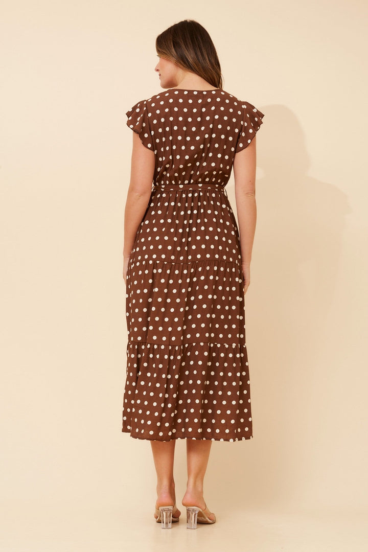 Womens polka dot midi dress featuring a crossover neckline and frill sleeves, designed for a relaxed fit, perfect for wedding guests and summer events. 5