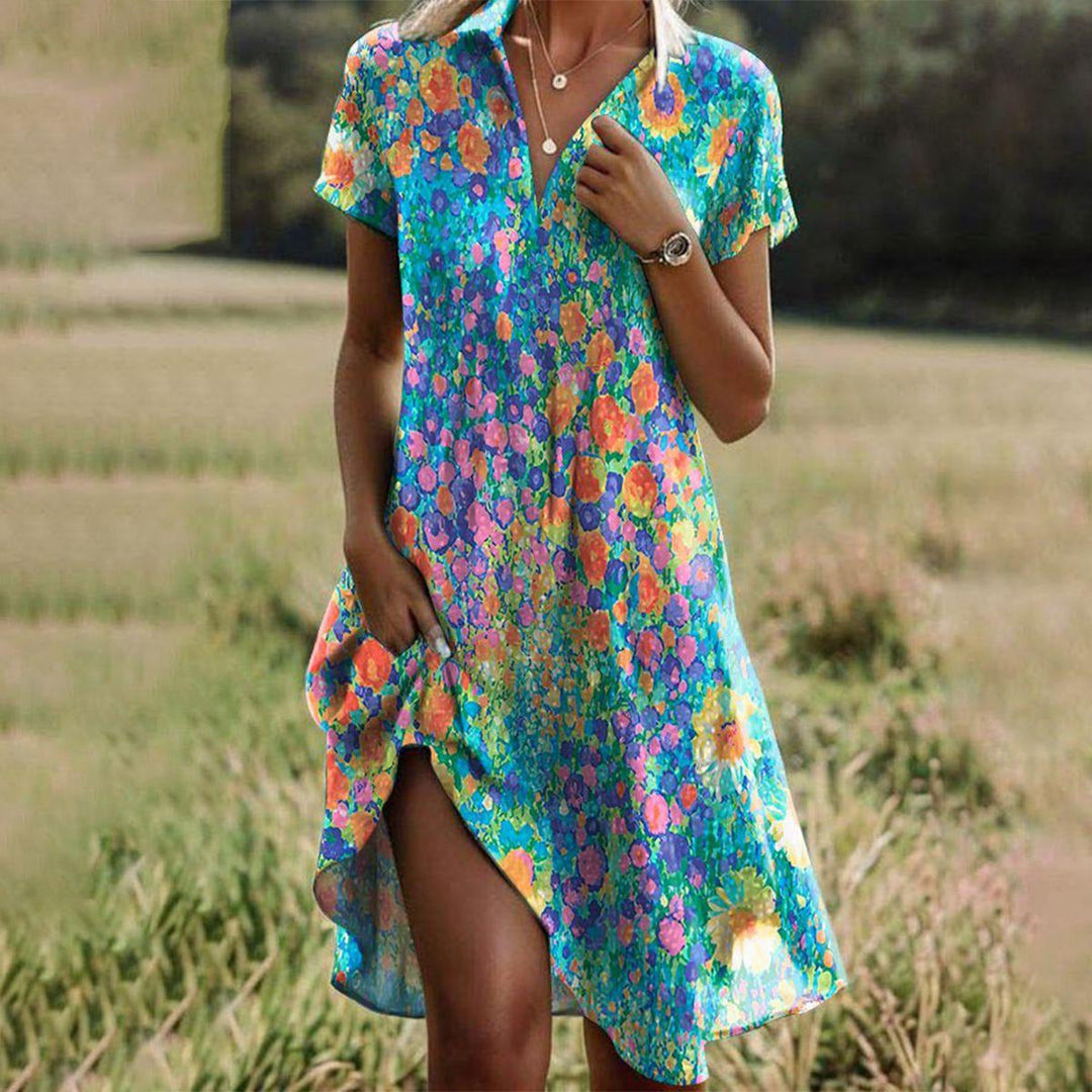 Lightweight floral print summer dress for women featuring a relaxed fit, short sleeves, and convenient side pockets. Perfect for casual outings and warm weather. 0