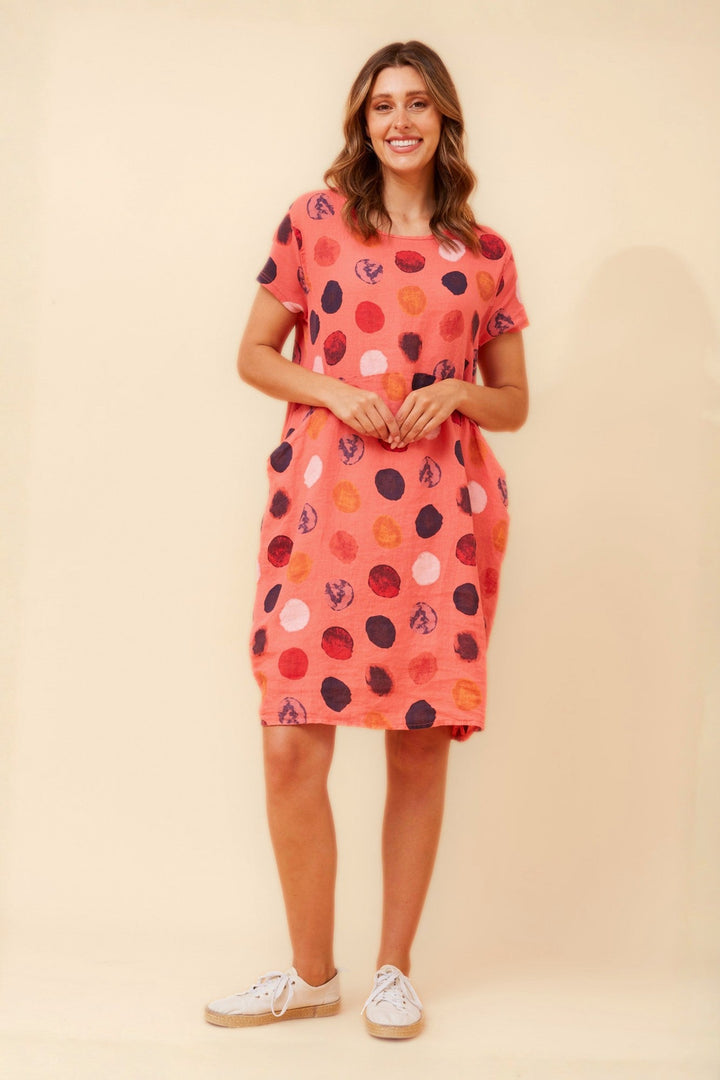 Women's knee-length polka dot linen summer dress with short sleeves and side pockets, featuring a relaxed fit for comfort and style. 10