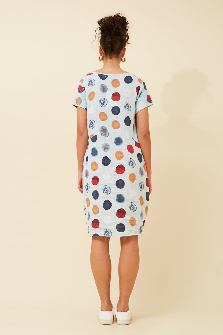 Women's knee-length polka dot linen summer dress with short sleeves and side pockets, featuring a relaxed fit for comfort and style. 4