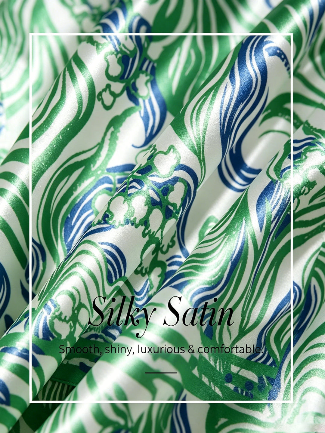 Womens top featuring an asymmetric hem and batwing sleeves in an abstract floral satin design, perfect for stylish and comfortable everyday wear. 3