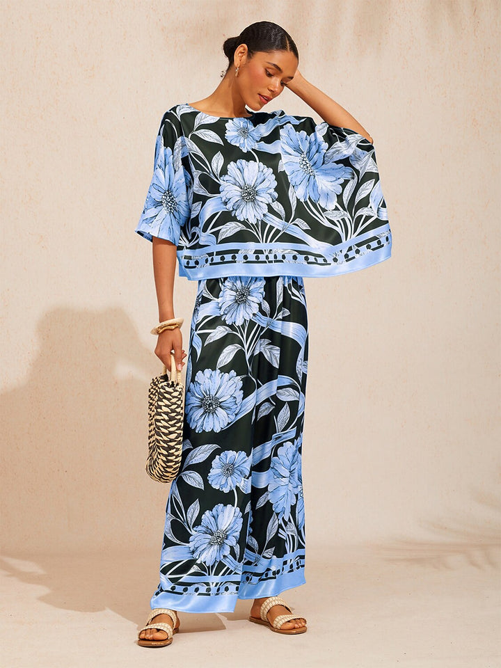 Womens floral satin top in cream yellow featuring an asymmetrical hem and stylish kimono sleeves, perfect for a night out. 10