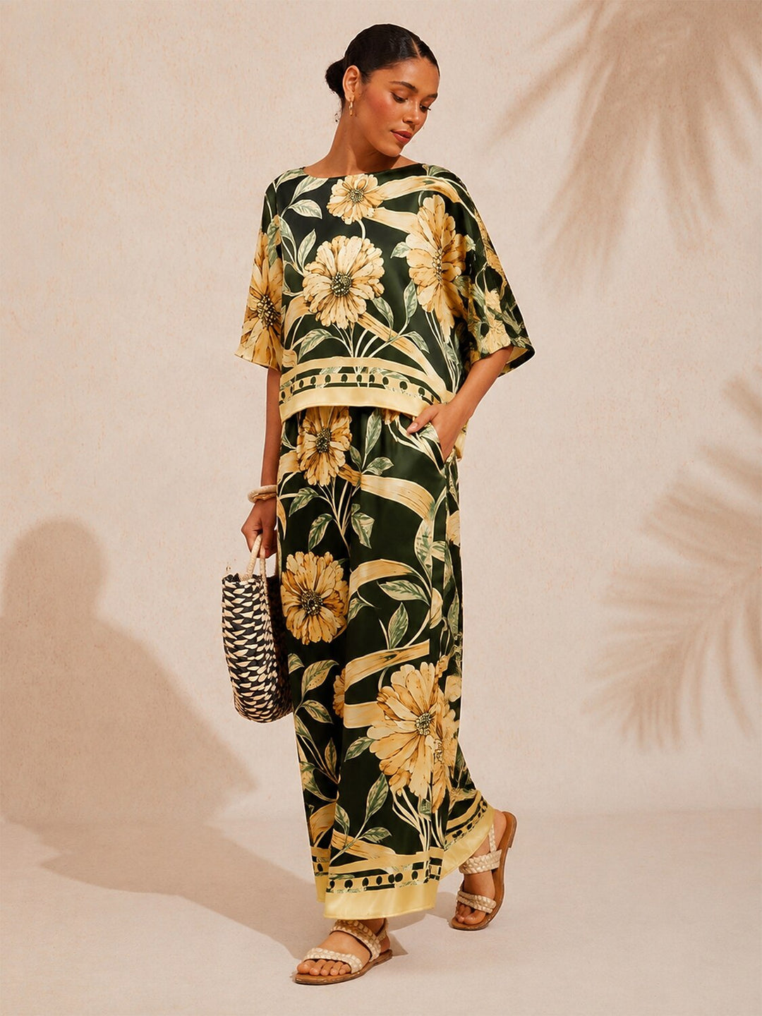 Womens floral satin top in cream yellow featuring an asymmetrical hem and stylish kimono sleeves, perfect for a night out. 2