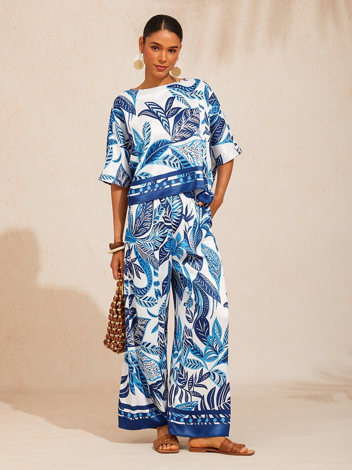 Womens top featuring an asymmetrical hem and kimono sleeves, crafted from silky satin with a golden petal print, perfect for a stylish night out 17