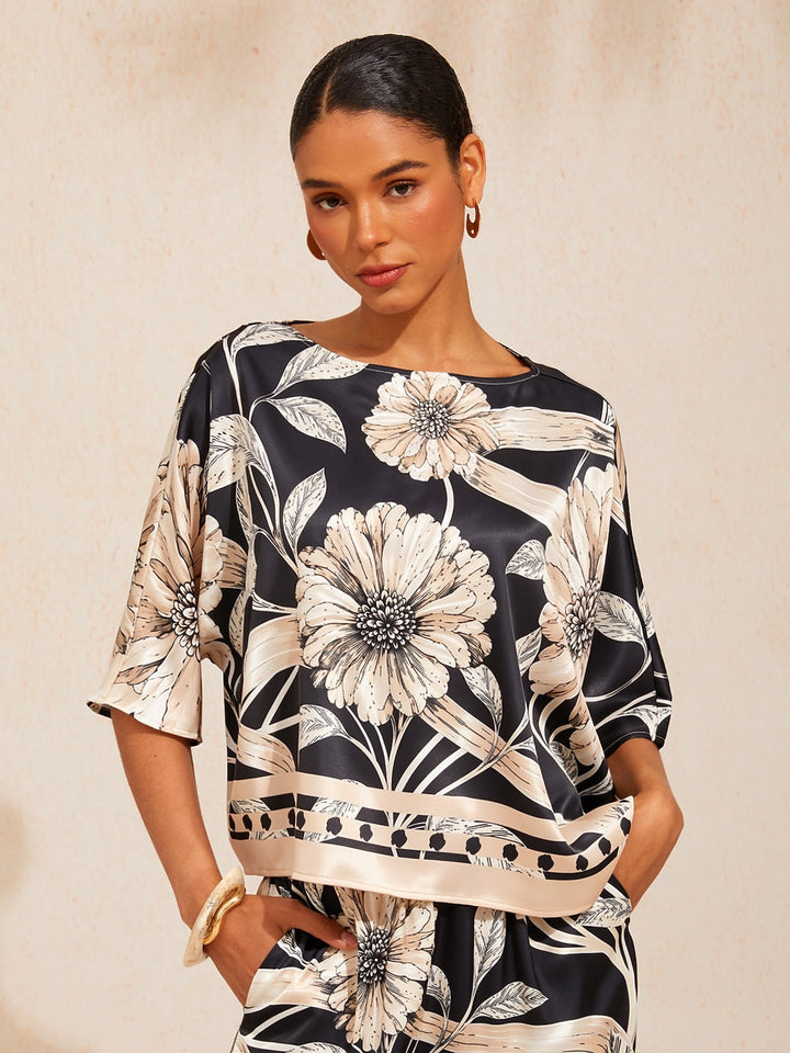 Womens top featuring an asymmetrical hem and kimono sleeves, crafted from silky satin with a golden petal print, perfect for a stylish night out 4