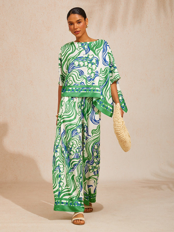 Womens top featuring an asymmetrical hem and kimono sleeves, crafted from silky satin with a golden petal print, perfect for a stylish night out 8