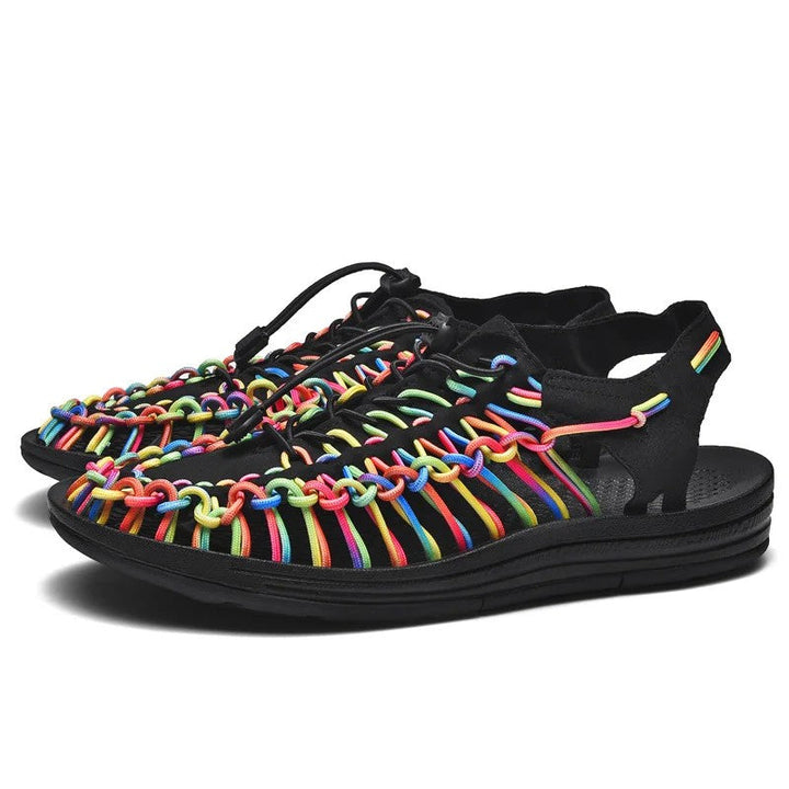 Woven beach sandals featuring a breathable design and lightweight flat sole, perfect for casual outdoor beachwear. 10