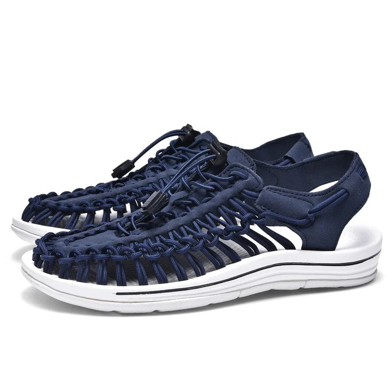 Woven beach sandals featuring a breathable handcrafted design and a lightweight flat sole, perfect for casual outdoor comfort. 7